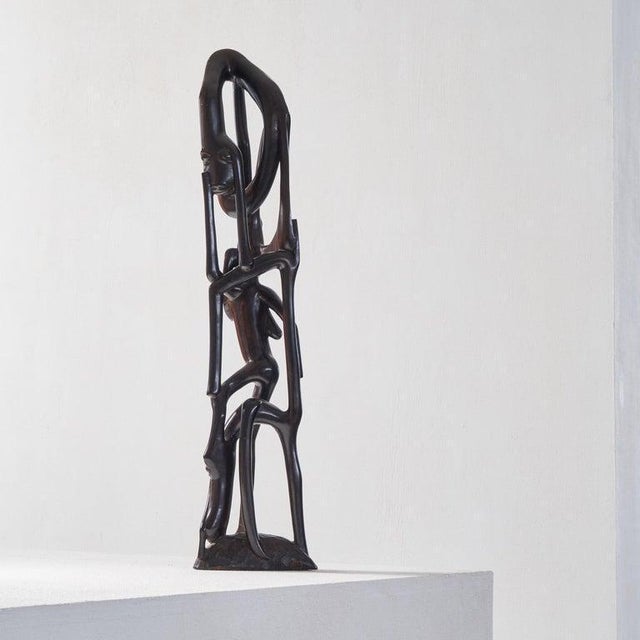 This is a wonderful piece of modernist African art. It is a so called 'Makonde' sculpture. These unique pieces are crafted...