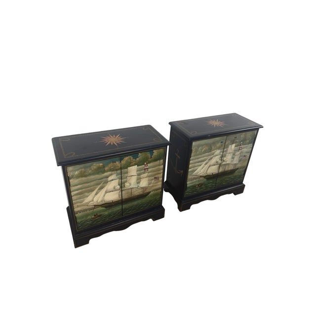 Bring the sea into a room without a single piece of driftwood. This matched pair of cabinets is hand-painted with a...