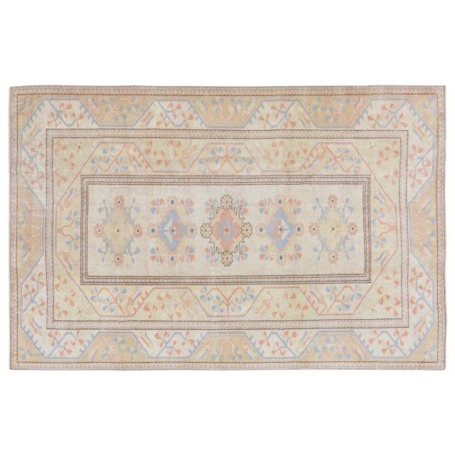 Hand-knotted with care using traditional rug making techniques, this wool rug blends timeless craftsmanship with a modern...