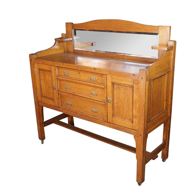 Antique Edwardian era Come-Packt buffet / sideboard / server. Made of quartersawn oak with Arts & Crafts and Mission...