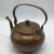 Wonderful age with this hand made and hand hammered copper tea pot with hinged pour spout flapper. Nice thick strap handle...