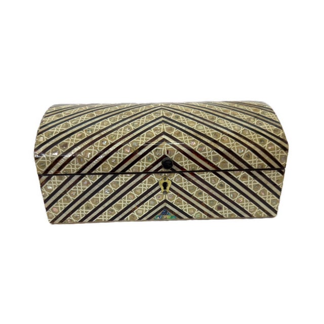 Discover the beauty of traditional Egyptian craftsmanship with this handcrafted wooden jewelry box, decorated with...