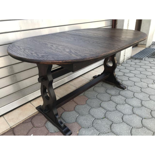 Oval extendable table from the 70's The table is in good to very good condition. All defects visible in the photos. The...