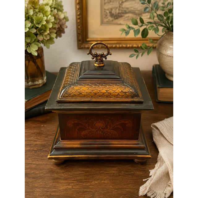 Substantial vintage decorative tea caddy and jewelry box with an ornate Regency Revival design. The architectural...