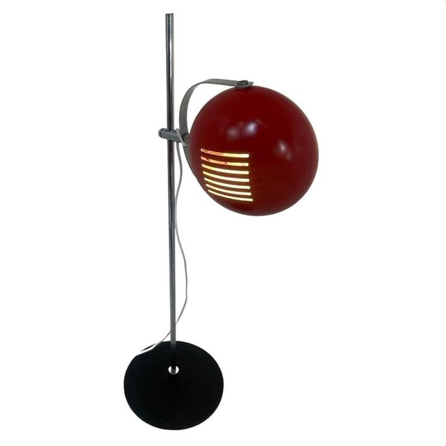Vintage mid century/ space age design table lamp made by the Dutch company Herda. It can swivel on the horizontal axis and...