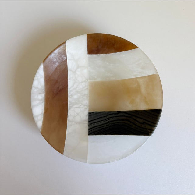 A wonderful handmade stone bowl, circa 1970s, made in Italy. Crafted of albaster and onyx layered together in...