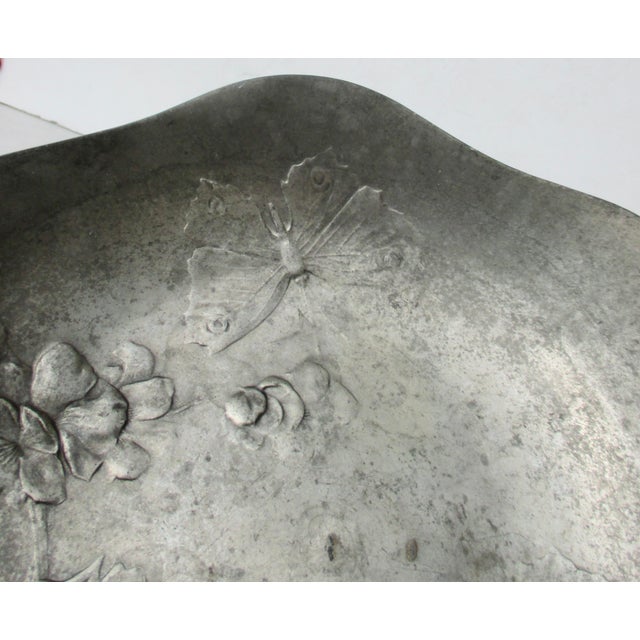 Kayserzinn pewter bowl from the turn of the century, wild roses and butterflies in low relief pattern in a shallow bowl...