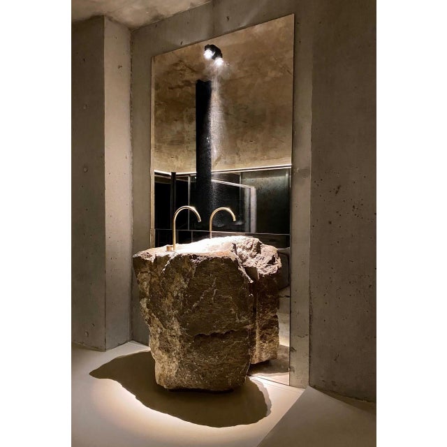 Unique totem sink in jurassic fossil stone by nerinea. Dimensions: w 45 x d 45 x h 90 cm. Materials: natural stone...