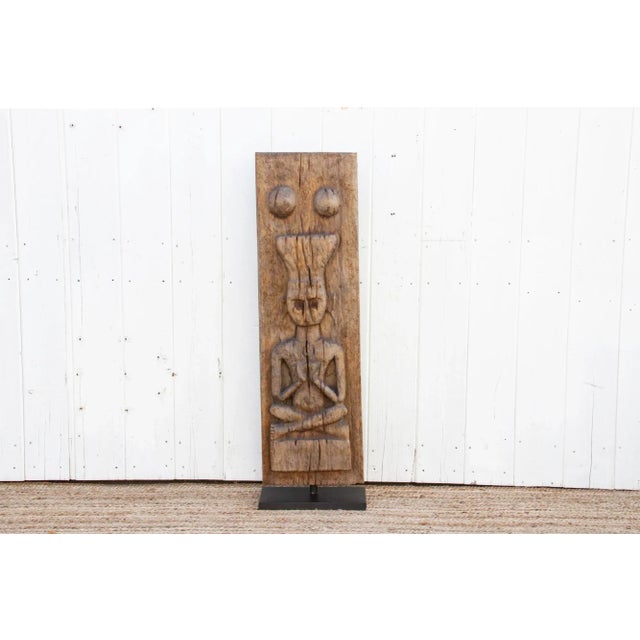 A 19th century carved Bastar panel was originally found in Orissa. It shows a beautifully carved tribal figure in a...