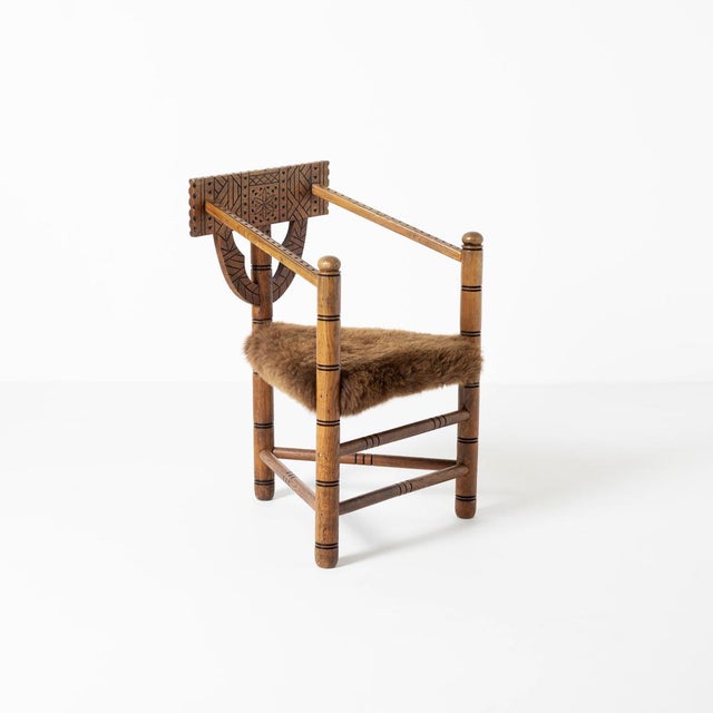 Hand-Carved Monk Chair with Brown Sheepskin Upholstery, Sweden, 1960s, in Restored conditions. Designed 1950 to 1959