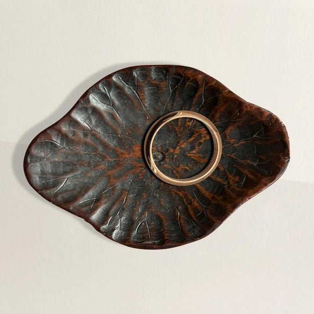 This exquisite petite carved wood dish from the Japanese Meiji period (1868-1912) masterfully depicts a lotus leaf in...
