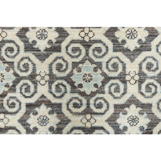 Crafted with the precision of Persian rug tradition and a contemporary sensibility, this Tabriz-style carpet offers both...