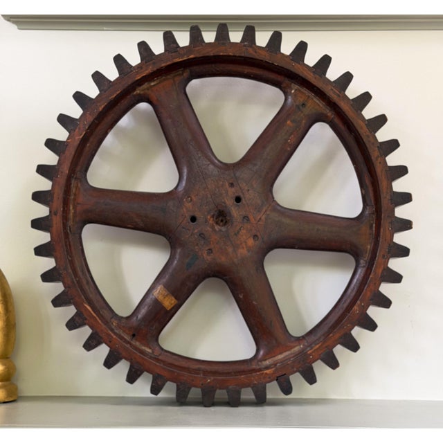 Large industrial patter for cogged wheel. Made of solid wood, and marked on the spokes with the product specifications....