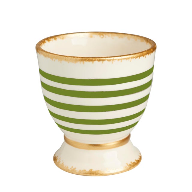 Handmade in Portugal, this cachepot is decorated with a striped pattern. Available in black, green, or blue (with gold...