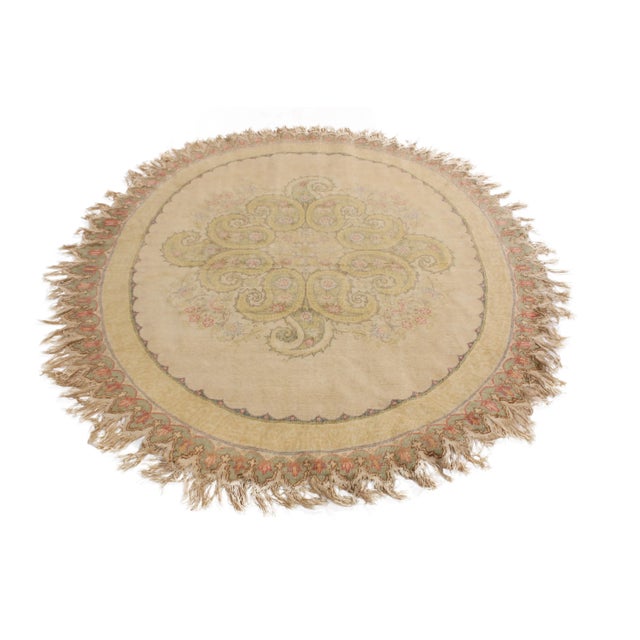 Originating from Turkey between 1930-1950, this vintage Hereke oval rug is hand-knotted with high-quality silk featuring a...
