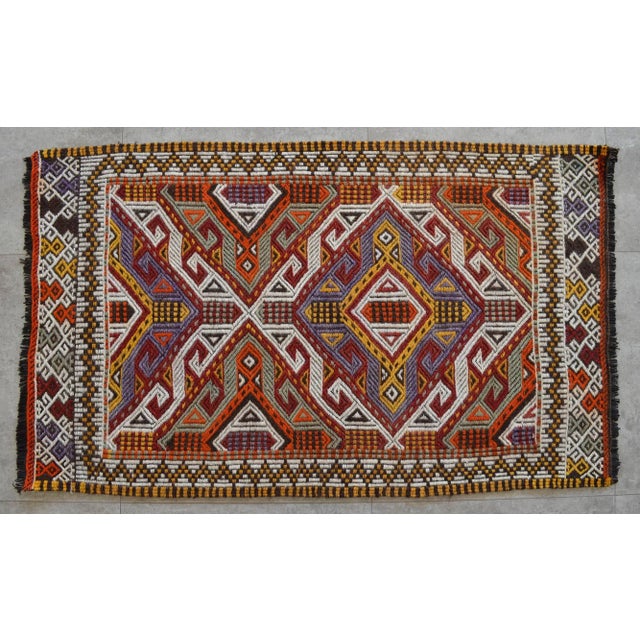 This Vintage Turkish handwoven rug made of organic sheep wool and colored with vegetable dyes. Dimensions: 28" x 46.4"...