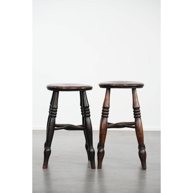 Offered for sale is this set of two timeless antique English Windsor stools from the 18th century with a wonderful patina....