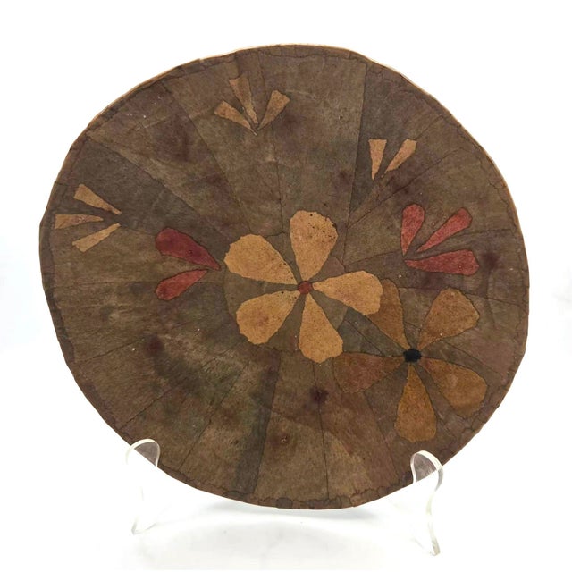 Offered is a vintage handcrafted Papier-mâché decorative pedestal bowl. It bears an illegible artist's maker's mark on the...