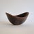 A beautiful, decorative stoneware bowl with glaze shifting in blues, black and brown. By Gunnar Nylund for Rörstrand,...