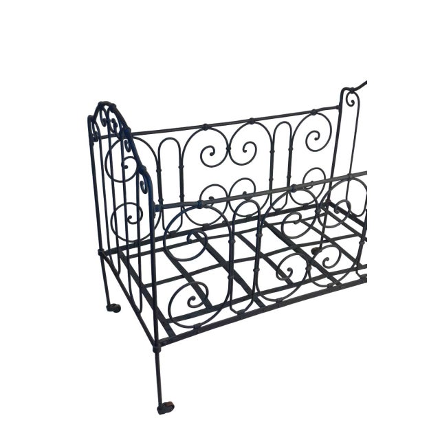 Antique baby cot 1890-1910 Anthracite gray enamelled wrought iron Complete with original wheels of the time Excellent...