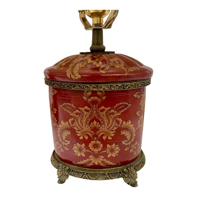 These vintage Oriental lamps are hand-painted with a floral design in red and gold on porcelain, with a bronze finish. The...