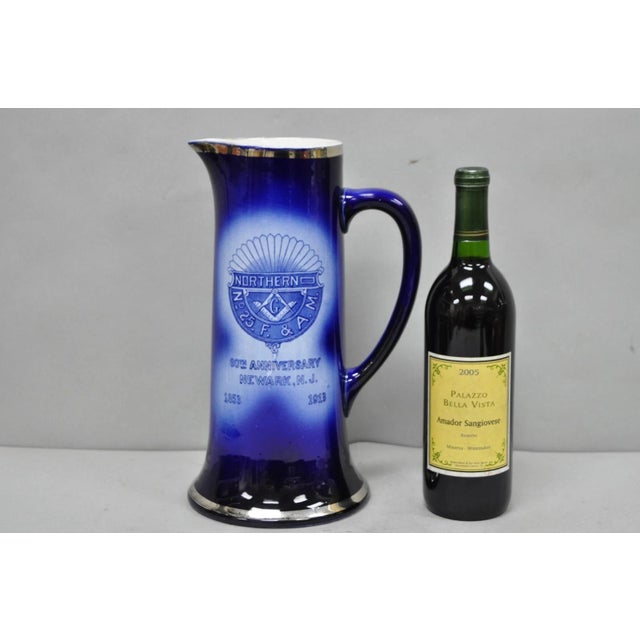 Antique 1913 60th Anniversary Northern Lodge No. 25 Masonic Cobalt Blue Ceramic Pitcher. Circa Mid 20th Century....
