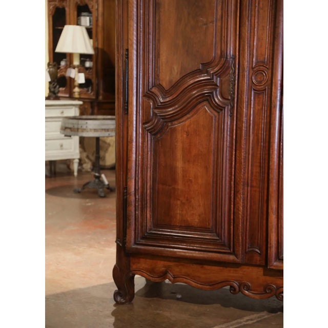 18th Century French Louis XV Carved Walnut Armoire Lyonnaise With Floral Motifs For Sale - Image 9 of 12