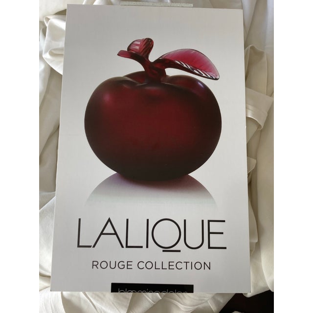 20th Century French Lalique Glass Apple. This deep crimson red apple perfume bottle displays an aesthetic intensity and...