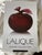 20th Century French Lalique Glass Apple. This deep crimson red apple perfume bottle displays an aesthetic intensity and...