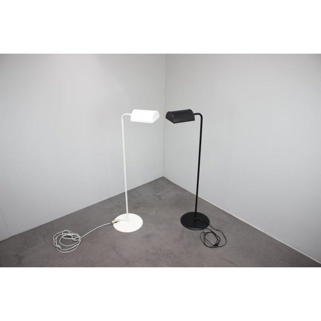 A refined pair of Mid-Century Modern floor lamps manufactured by Abo Randers in Denmark during the 1970s. Designed with...