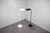 A refined pair of Mid-Century Modern floor lamps manufactured by Abo Randers in Denmark during the 1970s. Designed with...