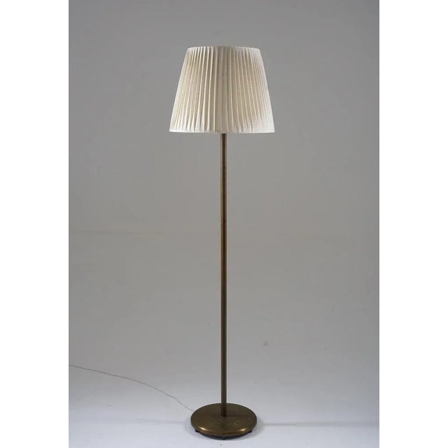 Large Scandinavian floor lamp model 15370, manufactured by Böhlmarks, Sweden, 1940s. This heavy lamp is made of solid...