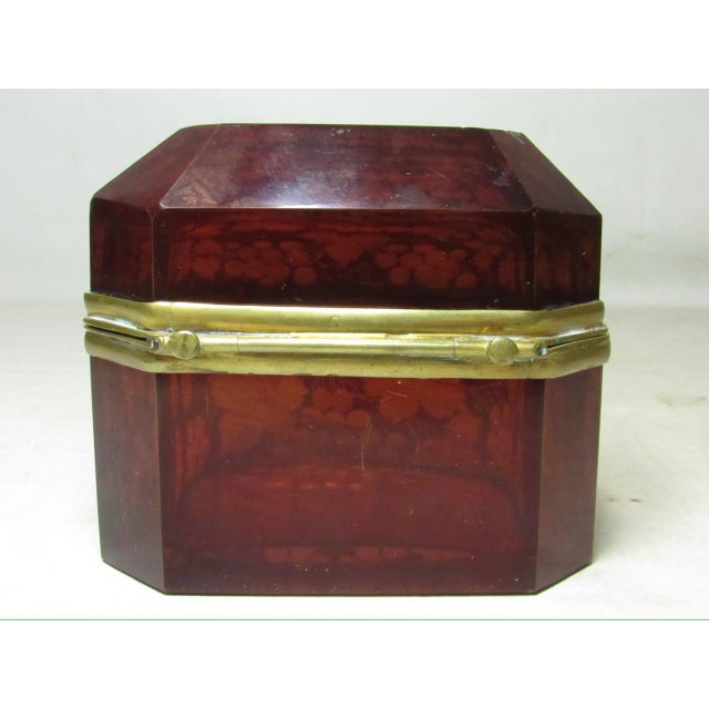 Antique Bohemian etched glass lidded jewelry box, c.1900 Having an octagonal shaped body and a domed top. The ruby red top...