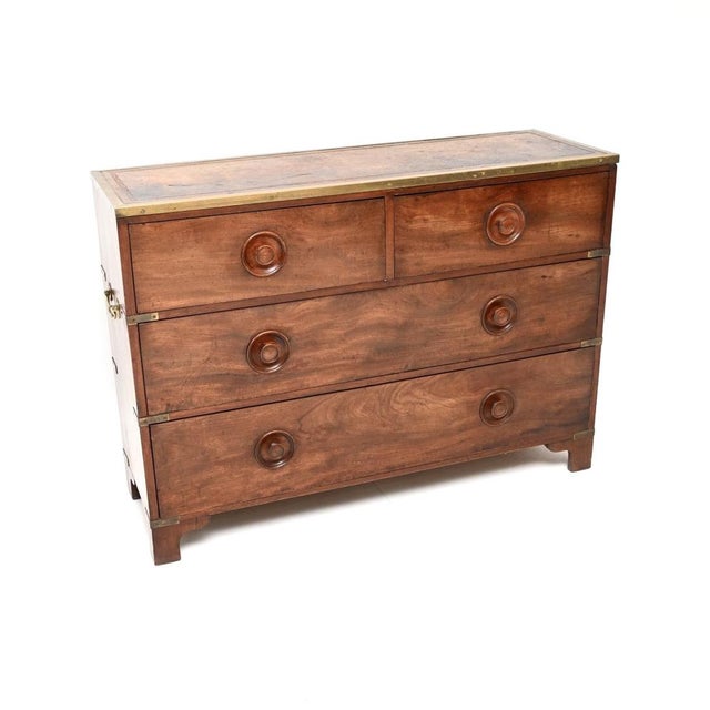 A fantastic antique leather top military campaign chest of drawers. This was made in England, we would date it to around...