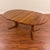 Vintage solid teak dining table with two self-storing leaves and a split pedestal base, made in Denmark by Langeskov...