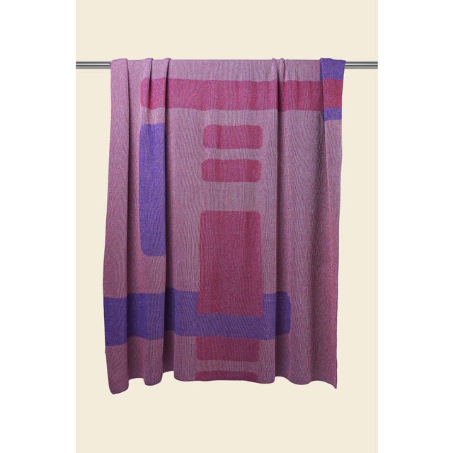 Soft, breathable, and designed to move effortlessly between seasons, this knitted blanket is made from a luxurious blend...