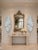 A striking and highly decorative pair of monumental banana leaf wall sculptures, made and designed by Julio Jimenez,...