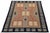 This striking handmade wool rug masterfully blends traditional Diné (Navajo) design elements with a clean, modern...