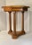 Three classic columns hold the vitrine top of this handsome side table from the late 1960’s. Stamped Peter F. Bollenbach...