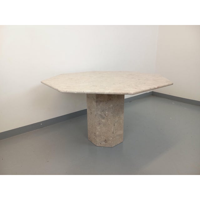 Vintage octagonal dining table from the 70s and 80s, in breccia marble composite, 8-faceted top, octagonal foot, very good...