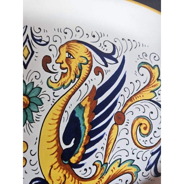One of Derutas most famous patterns depicting the air dragon! Hand Painted, charming and colorful. Great little serving tray.