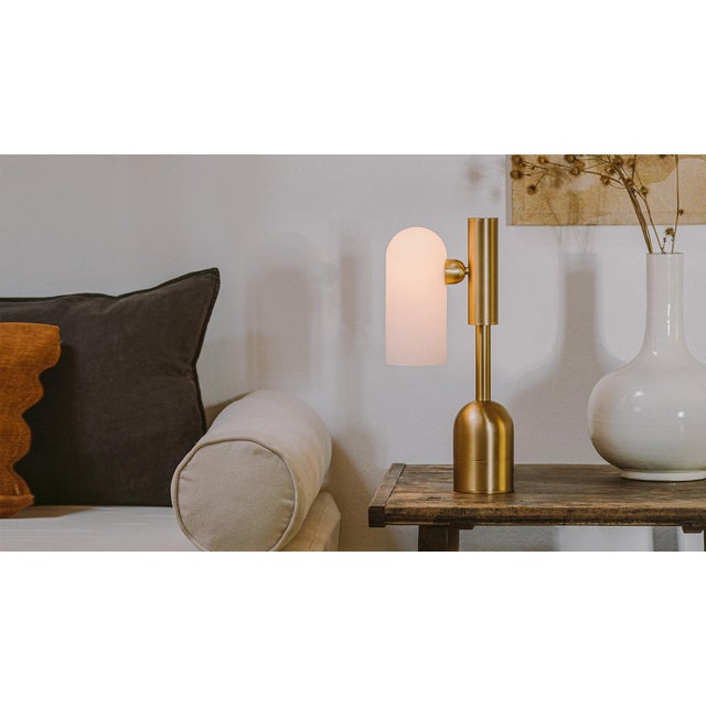 A guiding light is a powerful tool and a seductive force. The sturdy base of this table lamp ensures a stable instrument....