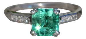 The Centella: Ladies Platinum Engagement Style Ring set with 1.21 CT Colombian Emerald