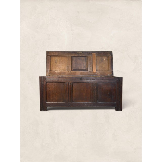 Antique 17th Century English Oak Coffer/Trunk Built to work hard and age honestly, this English oak coffer has spent...