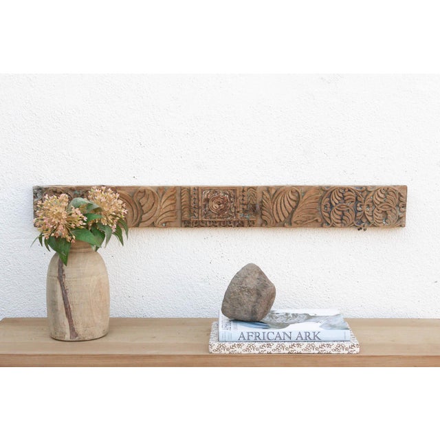 Uncover a piece of history with this authentic architectural carving, salvaged from the structures of 19th-century India....