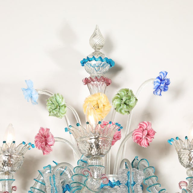 This ornate Pair of Mid-Century Hand-Blown Murano 3-Arm Classical Wall Sconces originated in Italy, Circa 1950. Each...