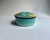 Tiffany & Co. Porcelain "World Discovery" two piece Trinket Box designed for Tauck Tours, 2000. Featuring a circular...