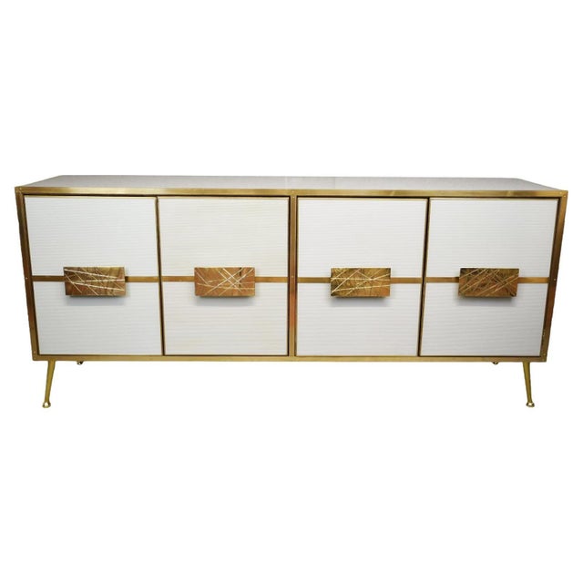 A stunning modern sideboard with white Murano “Grisinato” glass that showcases exceptional Italian craftsmanship and mid-...
