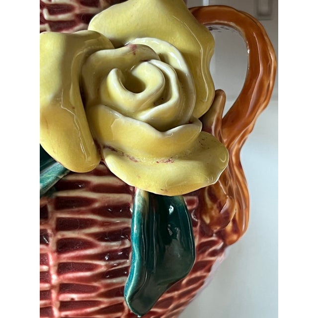 The table lamp was repurposed from a vintage Asian flower vase. The lamp has hardware for a harp but comes with a wicker...