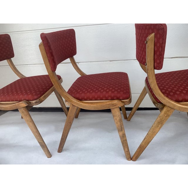 A set of four dining chairs was produced by Zakłady Mebli Giętych Radomsko It was designed by Juliusz Kędziorek. The...